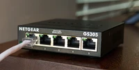 Add a network switch to your mesh routers to bring everything together.