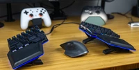 <p>Pourquoi j'ai choisi un clavier mécanique à disposition divisée avec tente</p>