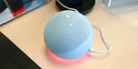 Why does my Amazon Echo light up in yellow, red, or green?